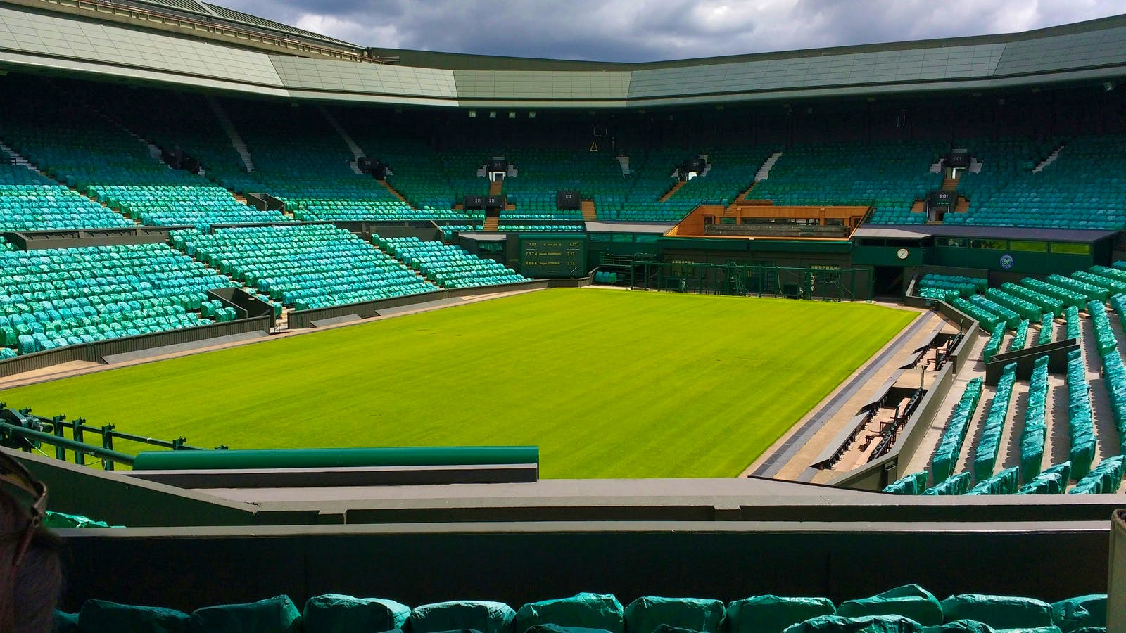A view of Wimbledon's centre court while empty, showing the serenity before the the chaos begins.
